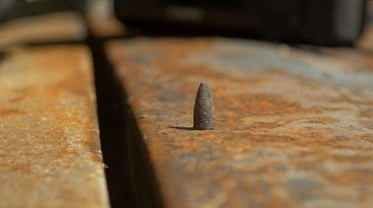 Адна з куль, якую RSF знайшлі ў згарэлым аўтамабілі Левіна Адна з куль, якую RSF знайшлі ў згарэлым аўтамабілі Левіна